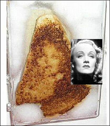 Is it just my imagination, or does the Virgin Mary in the grilled cheese sandwich look more like Marlene Dietrich?