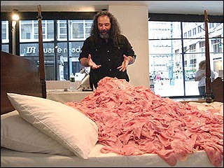 This guy made an entire bed out of sliced ham