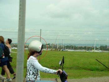 Something's wrong with her helmet, can you guess?