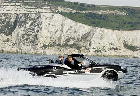 A crazy billionare driving around in his boat car.