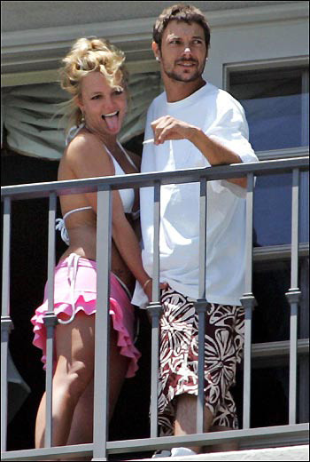Britney Spears grabbing a guys balls.  Naughty girl you