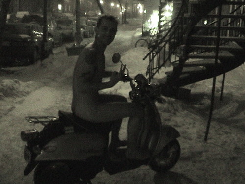 nude freak on is scooter in the winter time... Must be Canadian
