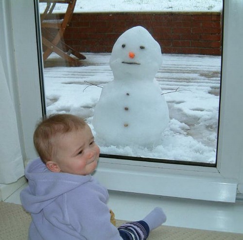 baby and a snowman