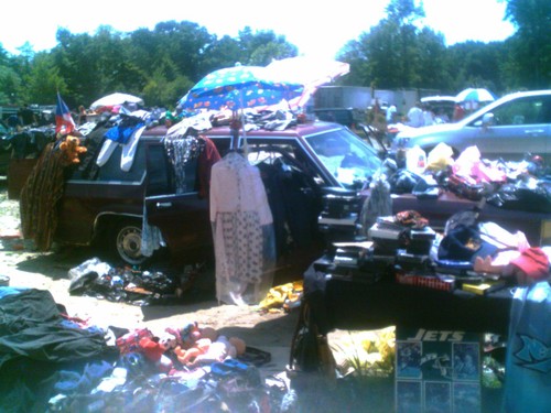 piles of cloth in car