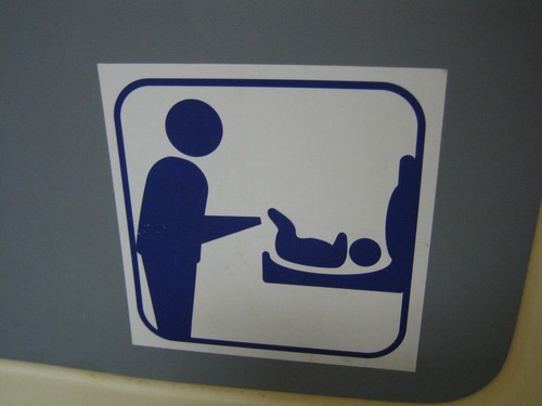 weird child chaning station sign