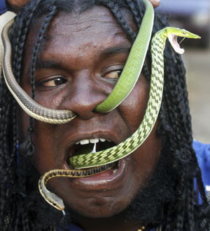 Snake man is at one with nature..and weirdness
