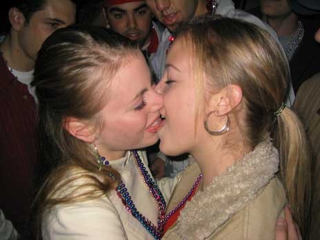 Girls kissing at a party