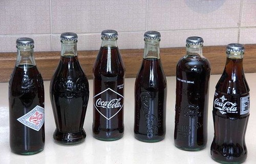 Coke bottles throughout the ages