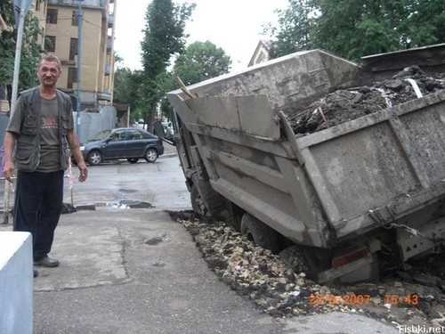 Truck sinks into the pavement