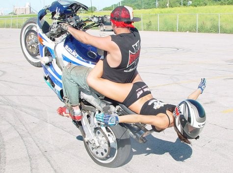 Motorcycle babe risks all for a sweet stunt