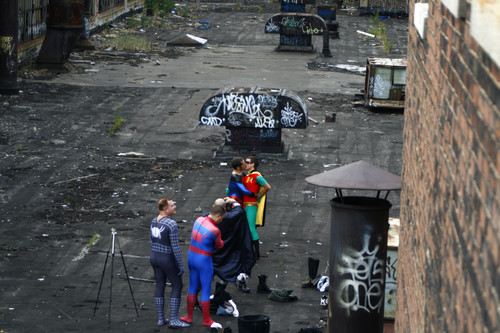 Gay superheroes chilling in the alley