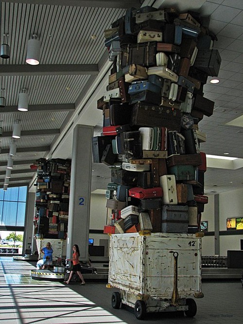 Luggage all crammed up to the ceiling
