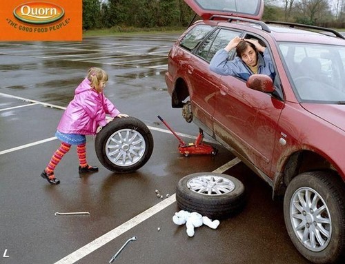 Change that tire, little girl!
