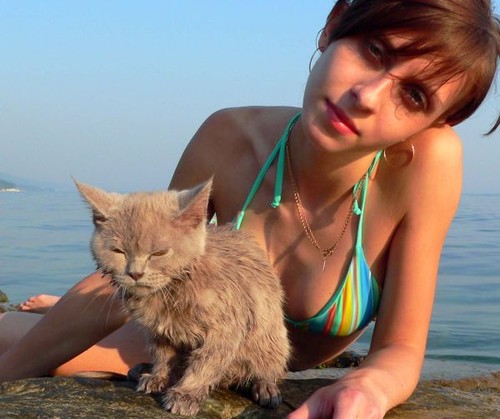 hot chick with a cat (also known as a pussy by some people)