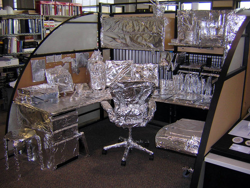 "Payback for thowing a foil ball at me. Every piece of paper, his computer, even any loose change was meticulously wrapped in foil. It took 12 hours to complete."